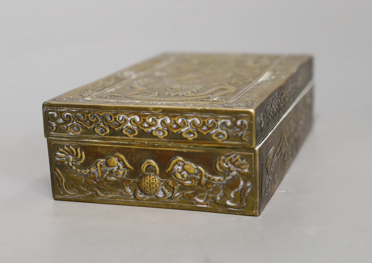 A 1920s Chinese brass 'dragon' cigarette box, 15.5cm